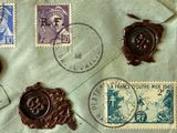 a lot of stamps that are on a piece of paper
