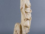 an image of a statue of a woman holding a child