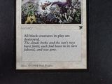 a picture of a card with a picture of a dragon on it