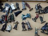 a lot of action figures that are in a box