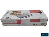 the box is open to show the contents of the game console