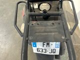 a motorcycle with a license plate on the back of it