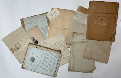 a pile of old papers on a white surface