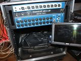 several electronic equipment are stacked on top of each other in a room