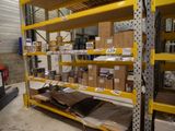 many boxes on the shelves in the warehouse