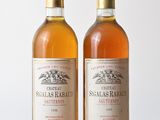 deux bouteilles de vin posées sur une table