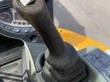 a close up of a steering control on a tractor