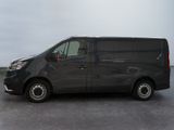a black van that is parked in a parking lot