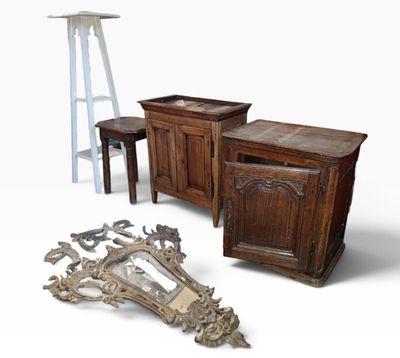 several pieces of furniture including a table, chair, and stool