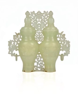 two vases that are sitting on a table