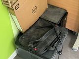 two suitcases sitting on the floor next to each other
