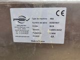 a label on the back of a machine that is not working
