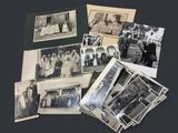 several old black and white photographs of people in formal attire