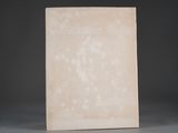 marble block on a gray surface with a black background