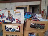 two boxes of toys sitting on top of each other in a garage