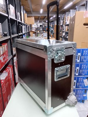 a metal case sitting on top of a table in a store