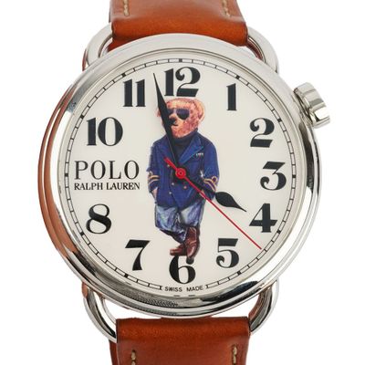 a close up of a watch with a polo bear on it