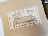 a box with a label on it that says billard nicolass
