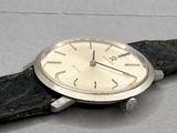 a watch that is sitting on a black leather strap