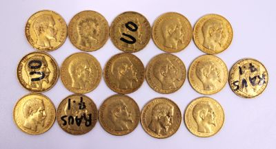 a lot of gold coins that are on the table