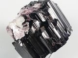 black tourmaline with pink tourmaline crystals on a metal stand