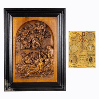 deux sculptures sur bois encadrées représentant une scène biblique et une plaque