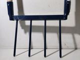 a picture of a chair made out of two wooden sticks