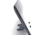 a close up of a cell phone on a stand