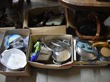 two boxes with pots and pans in them on the floor