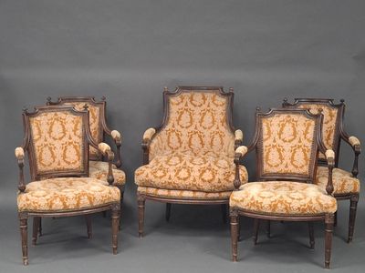three antique chairs with upholstered arms and a gold and white upholstered back