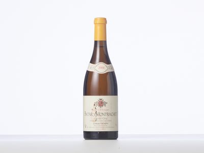 a close up of a bottle of wine on a table
