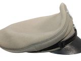 hat with buckles on the side of the hat is beige