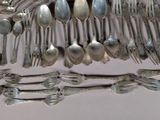 a lot of spoons and spoon spoons on the table