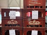 a stack of crates that have a lot of wine in them