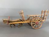 charrette tirée par des chevaux, avec des sièges et des roues en bois