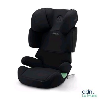 the child ' s car seat is black and has a green seat belt