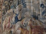 a picture of a tapestry on the wall of a room