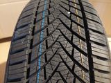 a close up of a tire with a blue stripe on it