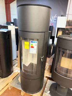 many different types of wood burning stoves in a store