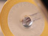 a close up view of a yellow and white object