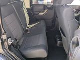 the back seats of a car are black in color
