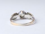 a close up of a ring with a stone in it