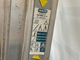 a close up of a metal door with stickers on it
