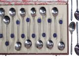 a box with a set of spoons and spoons in it