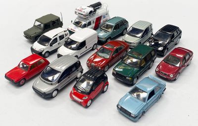 a lot of toy cars that are on the table