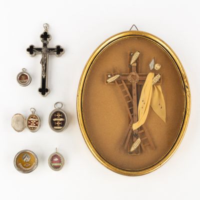 an image of a picture of a cross and other religious items