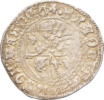 gros plan d'une pièce de monnaie sur fond blanc