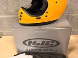 a helmet on top of a box on a table