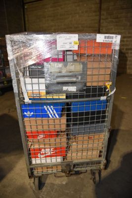 a metal cart with a bunch of boxes on top of it