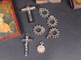 many religious items that are on a table